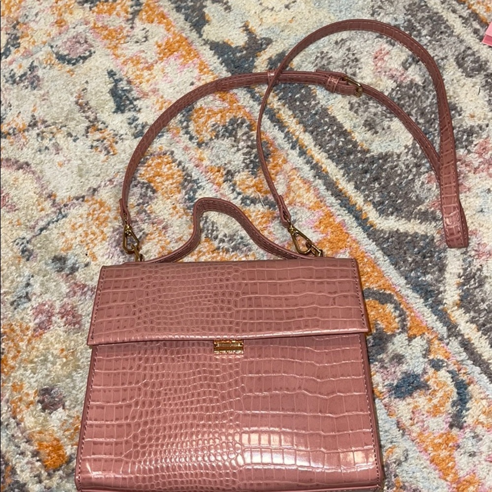Pink crocodile skin purse